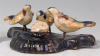 Lot 458 - A 19th century Whieldon type group of doves,...
