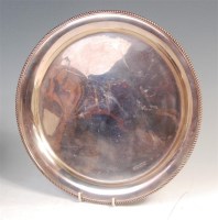 Lot 466 - An early 20th century silver salver, of...