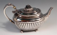 Lot 476 - A Goldsmiths & Silversmiths Company teapot, of...