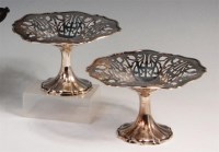 Lot 490 - A pair of George V silver pedestal sweetmeat...