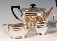 Lot 517 - A George V silver three piece teaset,...