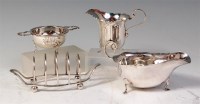 Lot 519 - Mixed silver to include; a four piece...