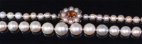 Lot 549 - An early 20th century knotted and graduated...