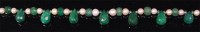 Lot 554 - A contemporary seed pearl and faceted emerald...