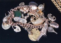 Lot 529 - A 9ct gold curblink bracelet, containing...