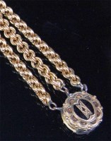 Lot 530 - A yellow metal double ropetwist long necklace,...