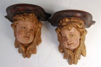 Lot 638 - A pair of 19th century polychrome and giltwood...