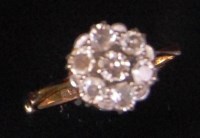 Lot 576 - An 18ct gold ladies diamond cluster ring,...