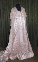 Lot 586 - An Edwardian silk satin full length dress,...