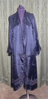 Lot 591 - A Victorian black silk evening coat, with...