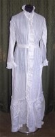 Lot 597 - An Edwardian white cotton servants(?) dress,...