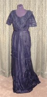 Lot 598 - A late Victorian black silk and net evening...