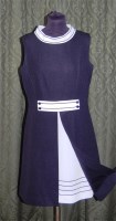 Lot 600 - A 1960s black and white crepe mini-dress, with...
