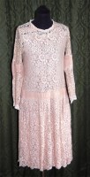 Lot 605 - A 1920s cream lace ladies long sleeved...