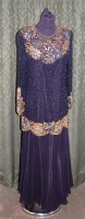 Lot 606 - A 1920s black chiffon and beaded evening dress,...