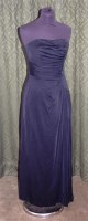 Lot 611 - A 1950s Ricci Michaels black ladies strapless...