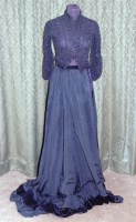 Lot 612 - A Victorian black silk dress, with silk velvet...
