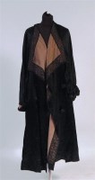 Lot 626 - A 1920s G Eyres & Sons of Bath black silk...