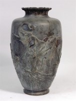 Lot 717 - A Japanese Meiji period bronze floor vase,...