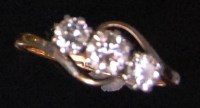 Lot 575 - An 18ct gold three diamond set ladies dress...