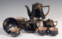 Lot 744 - A Japanese Meiji period porcelain four place...