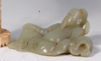 Lot 750 - A Chinese carved celadon jade figure of Lao...