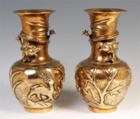 Lot 706 - A pair of circa 1900 Chinese brass vases, each...
