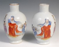 Lot 724 - A pair of Chinese famille rose vases, each...
