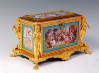 Lot 660 - A late 19th century French ormolu casket, set...