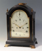 Lot 829 - A late Georgian ebonised bracket clock, by...