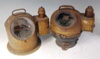 Lot 661 - A ships compass, housed in a brass binnacle...