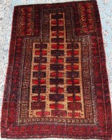 Lot 852 - A Persian woollen prayer rug, having a poled...