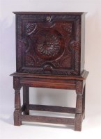 Lot 863 - An antique joined oak escritoire, on...