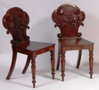 Lot 871 - A pair of early Victorian mahogany hall chairs,...