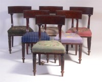 Lot 880 - A set of twelve circa 1830 mahogany dining...