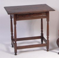 Lot 881 - An early 18th century joined oak single drawer...