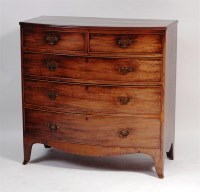Lot 905 - A Regency mahogany bowfront chest, of two...