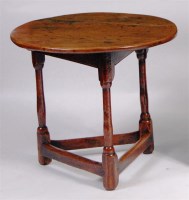 Lot 909 - An antique elm top and oak cricket table,...