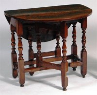 Lot 919 - An 18th century joined oak gateleg table, of...