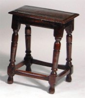 Lot 920 - An 18th century oak joint stool, on turned and...