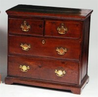 Lot 927 - An antique oak chest, having two short and two...
