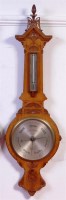 Lot 832 - A late Victorian oak two dial wheel barometer,...