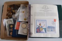 Lot 2157 - An album of 12 various commemorative coin...