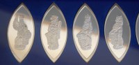 Lot 2182 - A cased set of ten silver ingots, The Queens...