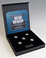 Lot 2224 - A cased set of five British silver threepence...