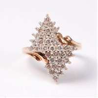 Lot 2531 - An 18ct diamond cluster ring, the two offset...