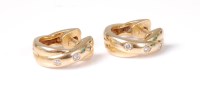 Lot 2578 - A pair of 18ct diamond earrings, the 4mm hoops...