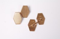 Lot 2616 - A pair of 9ct cufflinks, the hexagonal engine...