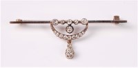 Lot 2627 - A diamond bar brooch, the centre of the bar...