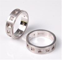 Lot 2632 - A pair of 18ct and diamond rings, each...
